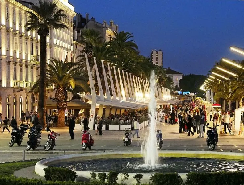 Palm-lined Riva waterfront promenade in Split